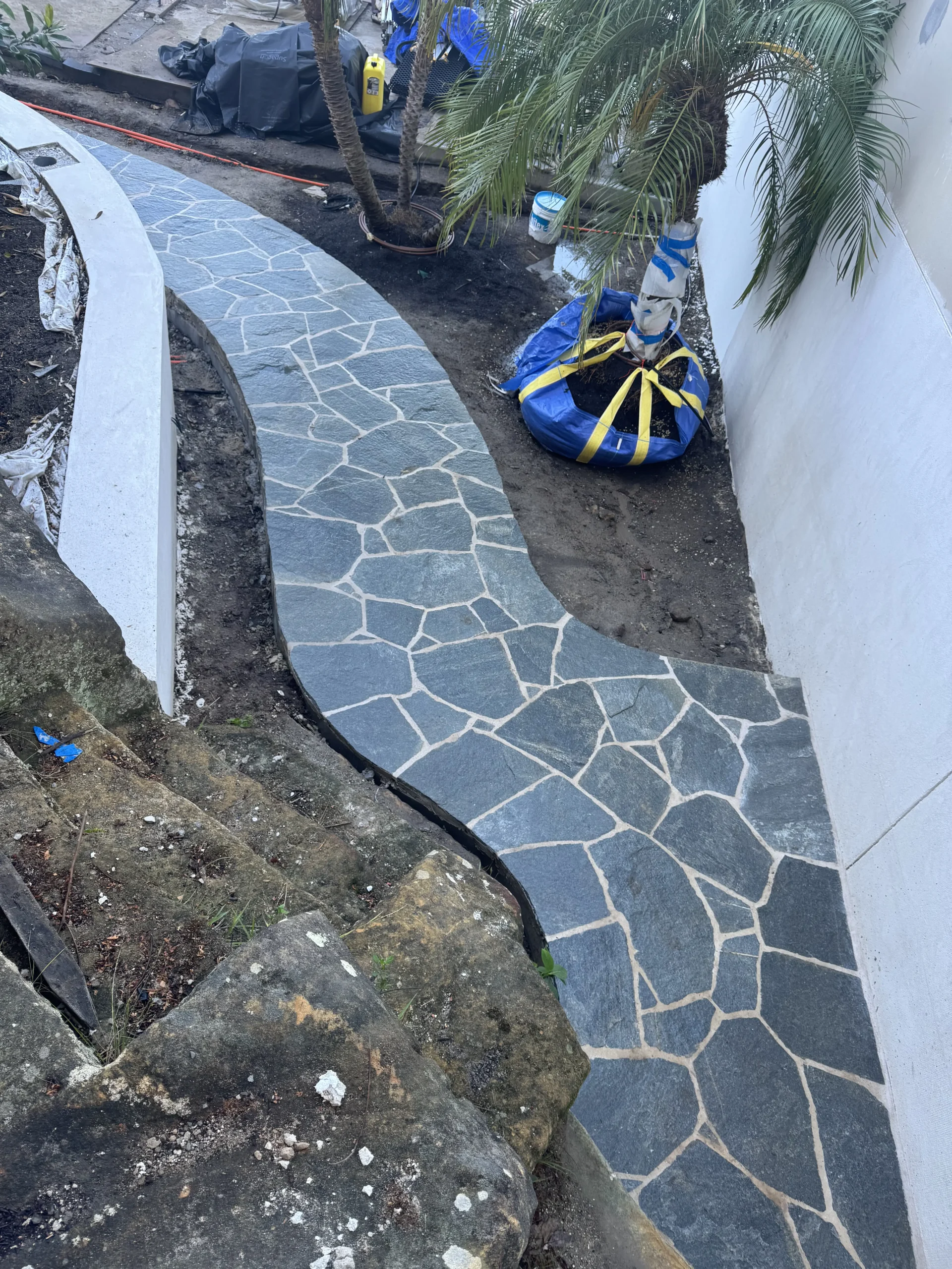 Bluestone crazy paving path beside Sydney Harbour