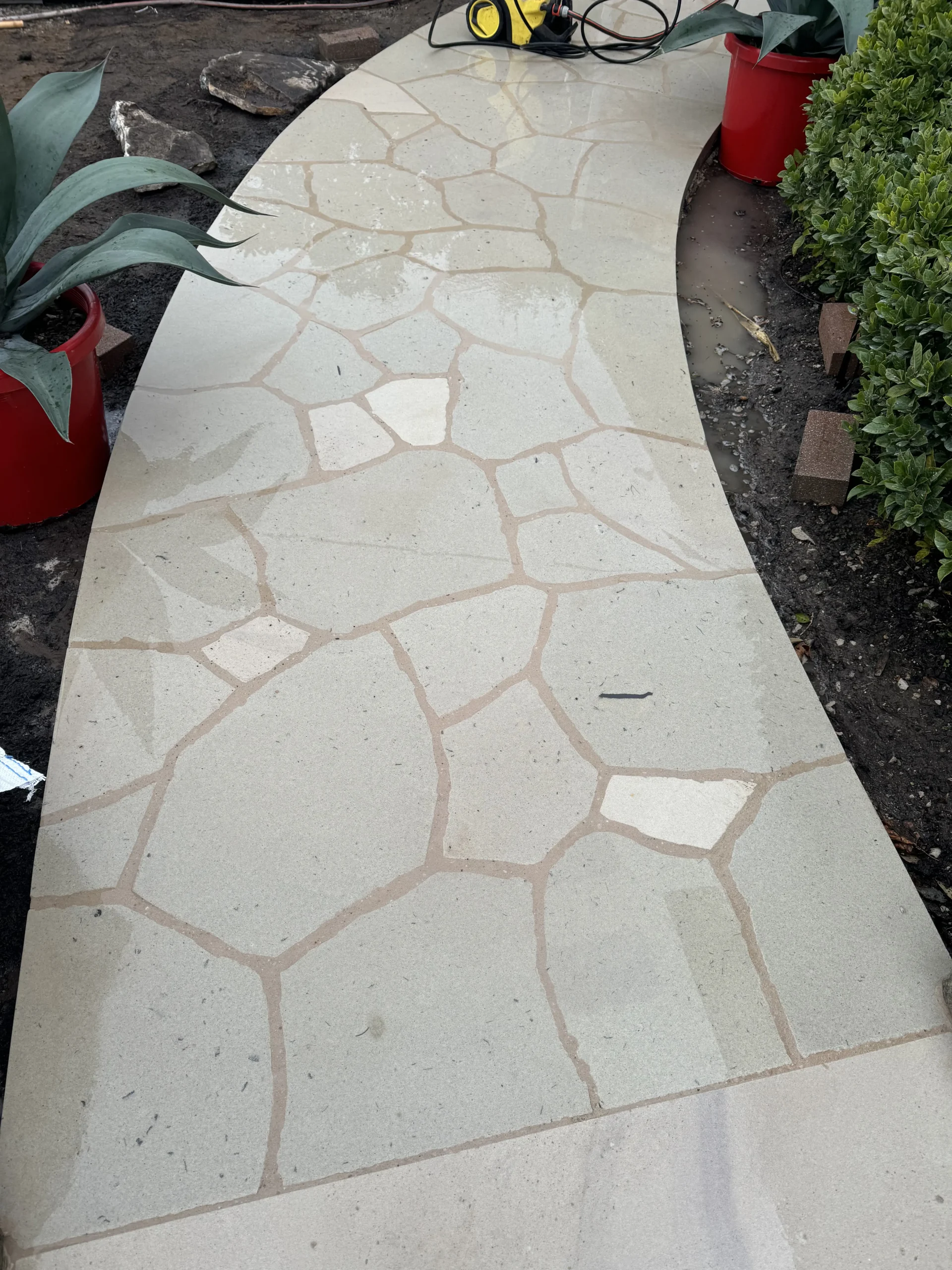 Close-up of a finished sandstone crazy-paved garden path