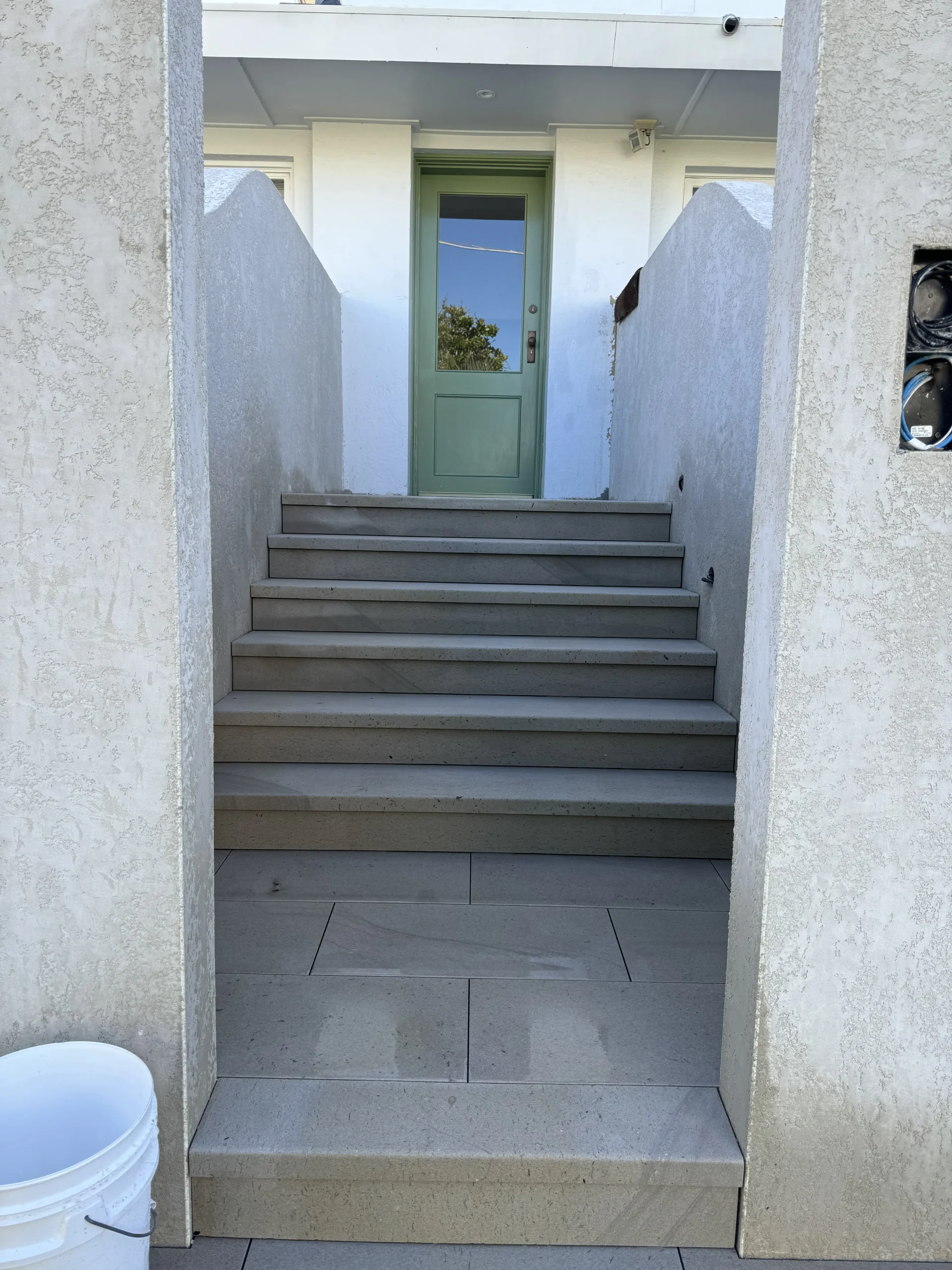 Modern polished stone staircase inside a home